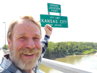 Claron Twitchell entering Jackson County, Missouri on Chouteau Trafficway bridge, Kansas City, Missouri